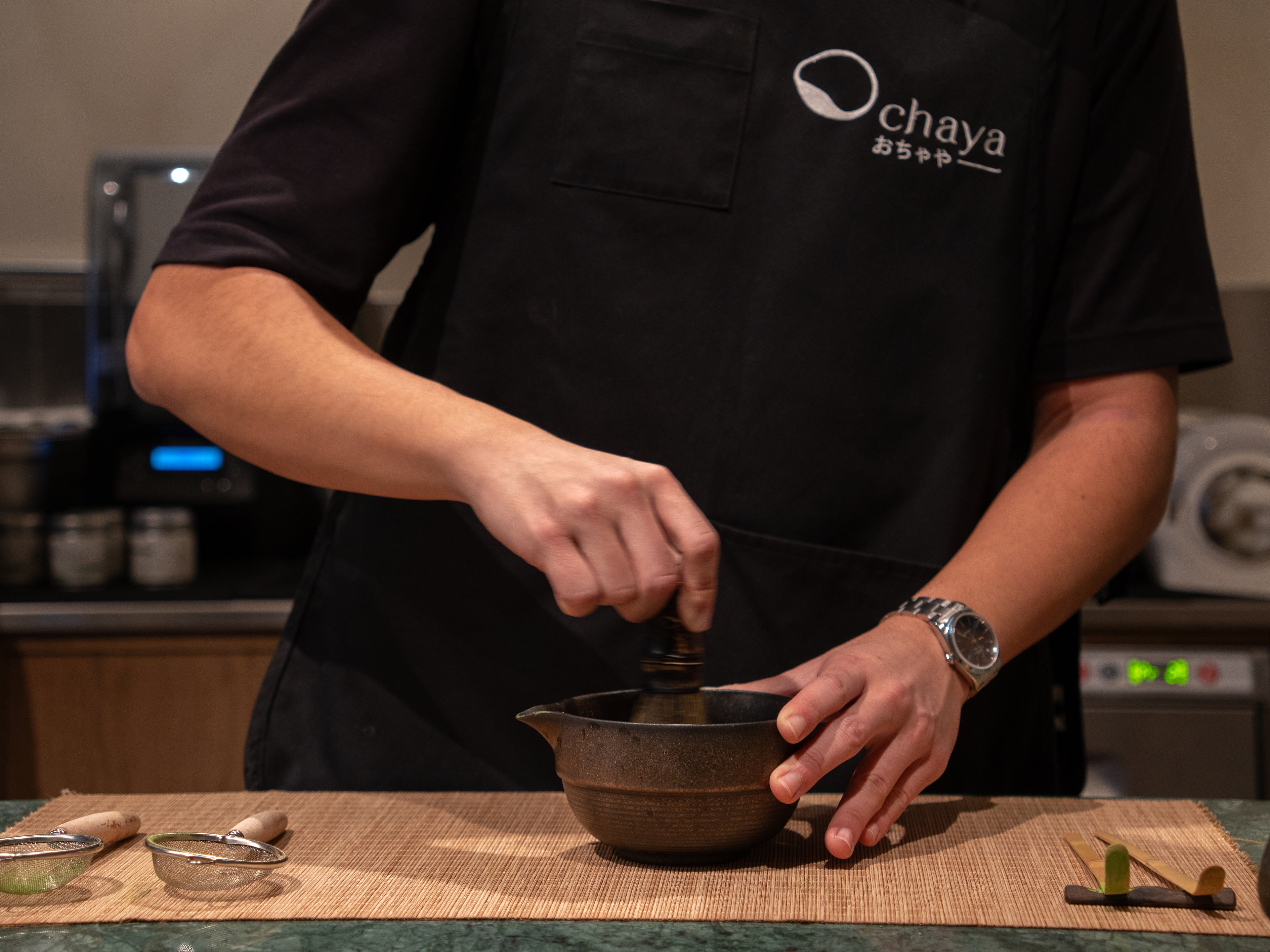 Whisking matcha